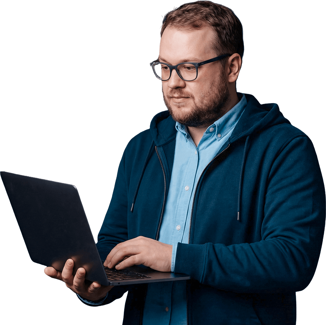 IT person on laptop happy because he's using NinjaOne