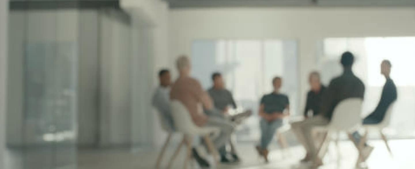 fürstenberg-institut-hero People sitting in a circle talking