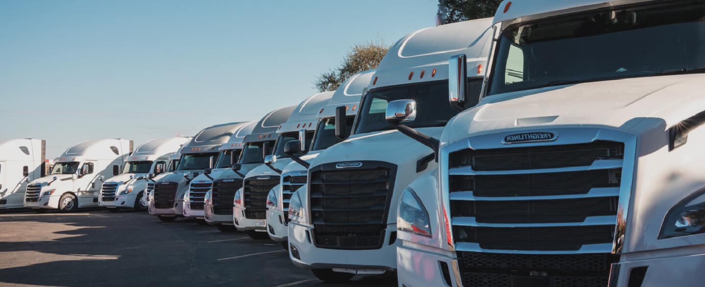 cali-truck-center-hero Row of parked work trucks