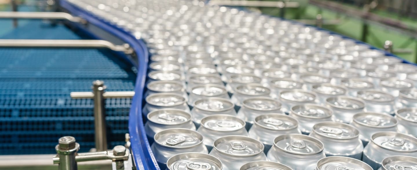 Conveyor,Line,Carrying,Thousands,Aluminum,Beverage,Cans,At,Factory.,Concept