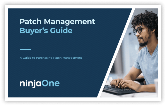 A image of a person typing in a keyboard and checking the Patch Management Buyer's Guide