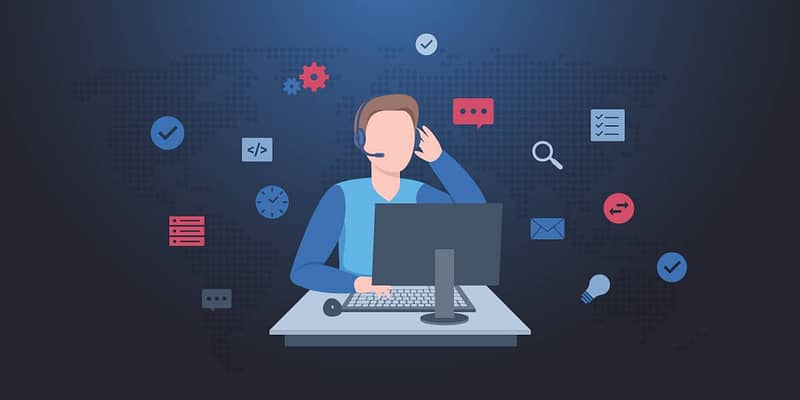 IT Worker on a PC representing unified IT operations management