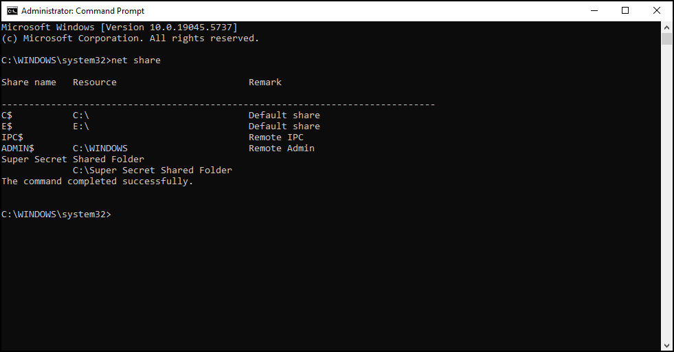 Open Command Prompt and run "net share" to display all network shares.